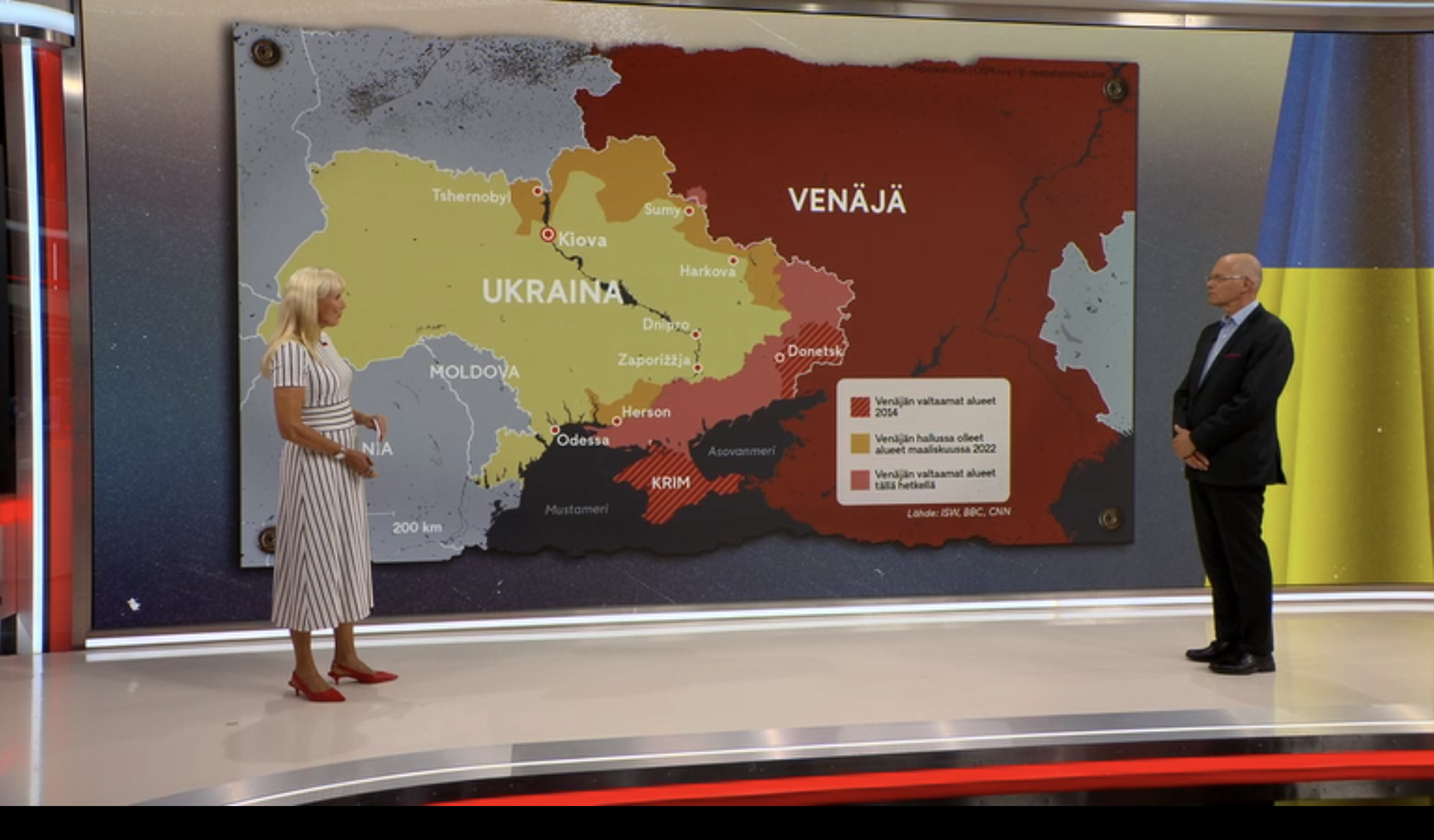 Finnish TV map shows Ukraine’s shifting frontlines: Crimea annexed in 2014, further areas seized in 2022, and expanded Russian occupation today.