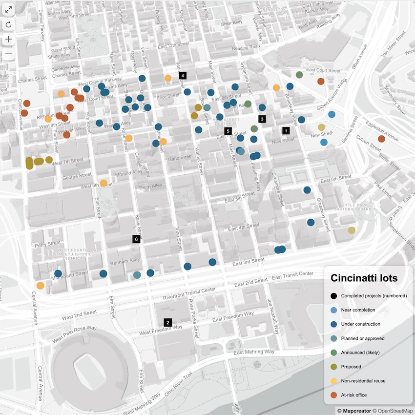 Map of downtown Cincinnati showing development sites and lots categorized by project status such as completed, under construction, planned, and at-risk
