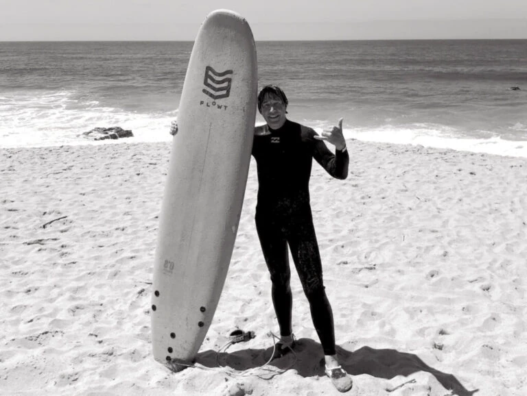Rob Bieling surfing photograph beach in black and white 