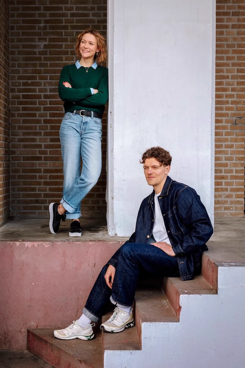 Robbert and Maggie standing on top of stairs